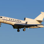 Dassault Falcon 2000EX private jet at takeoff