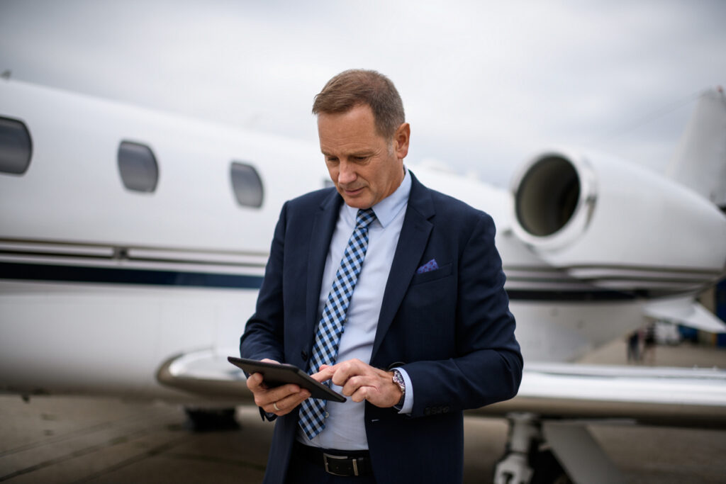 Aircraft owner reviewing flight activity and maintenance reporting