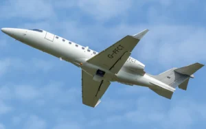 Learjet 45 private jet taking off.