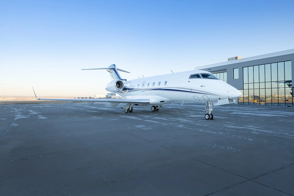 Sleek private jet illustrating the premium travel experience behind jet card vs charter comparisons.