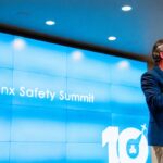 Jamie Walker delivers closing remarks at the Jet Linx Safety Summit in 2026.