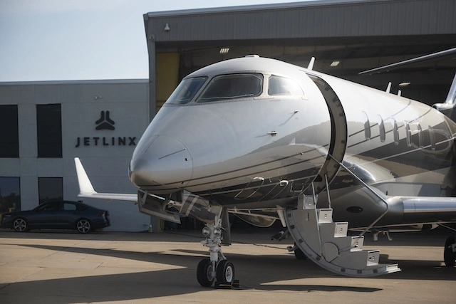 Private jet preparing for departure at a private terminal